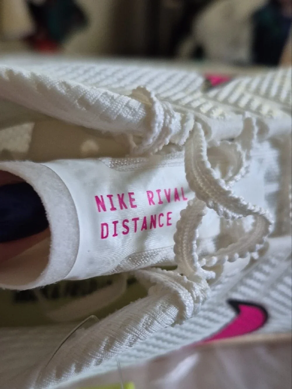 Nike White Athletic Shoes with Pink Swoosh